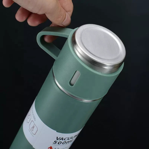 A set of one and two mugs made of stainless steel with a silicone handle