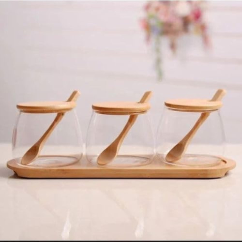 3-Storage Jars with a Wooden Spoon