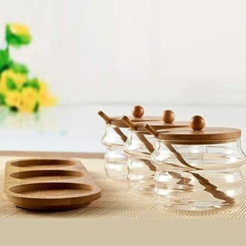 3-Storage Jars with a Wooden Spoon
