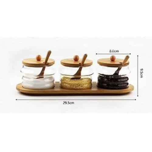 3-Storage Jars with a Wooden Spoon